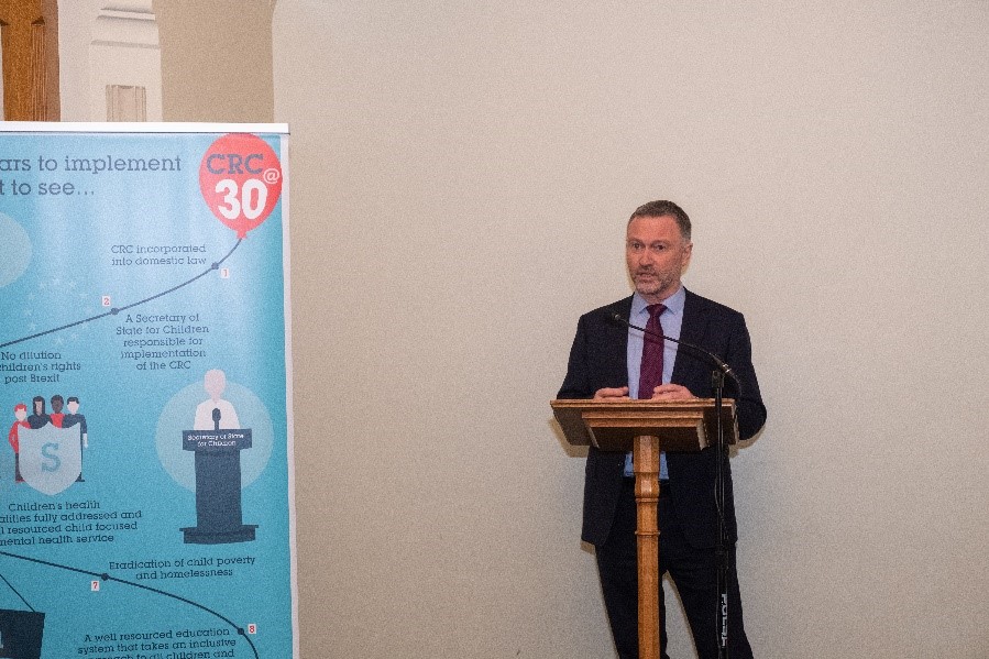 Man standing at lectern