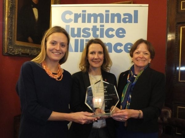 Members of the YJLC team collecting the award from Dame Glenys Stacey